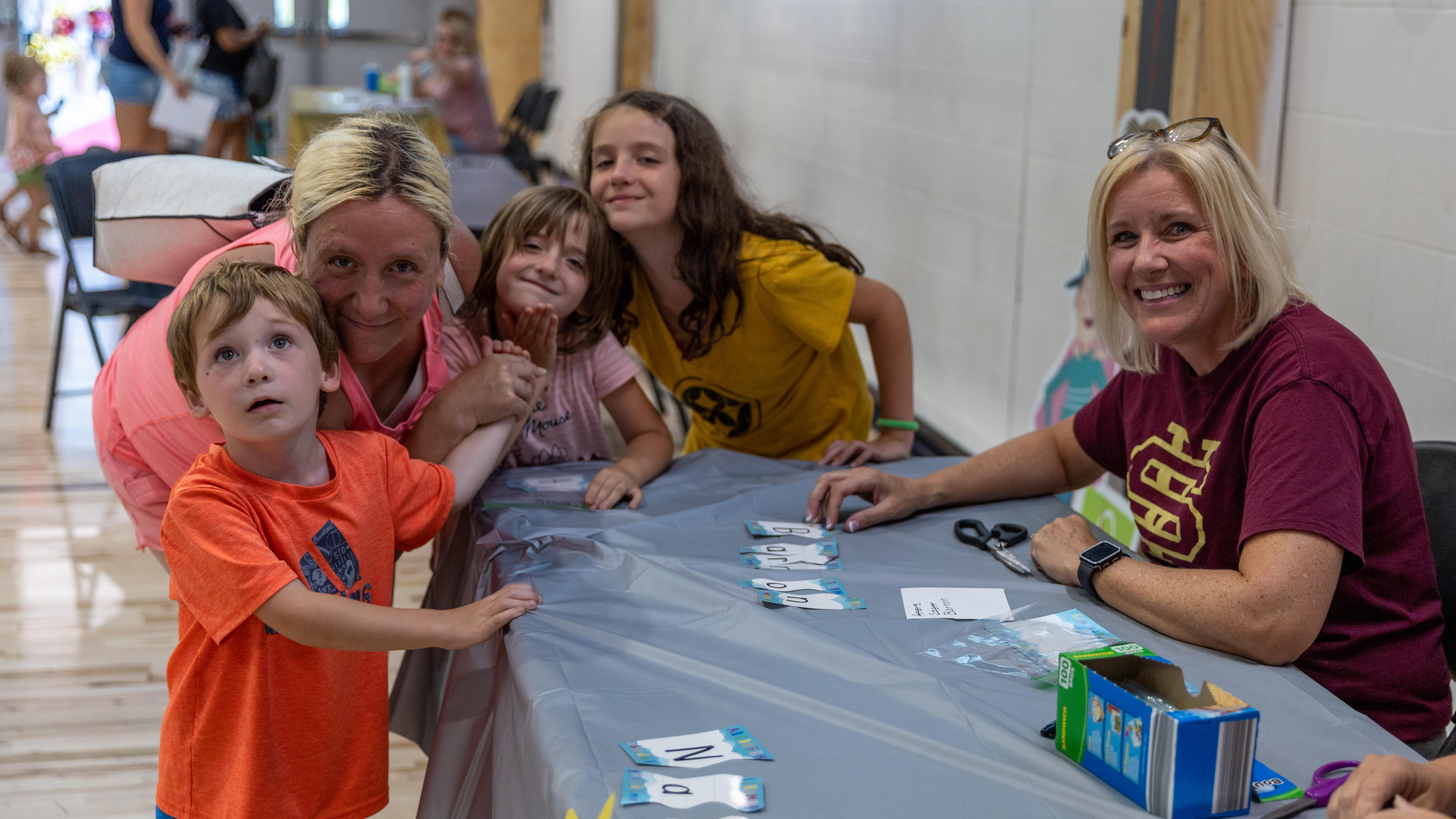Steel Valley teachers interact with new students families at the kindergarten registration and orientation event