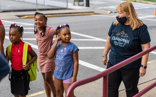 Students arrive at Barrett Elementary for kindergarten Transition Day.