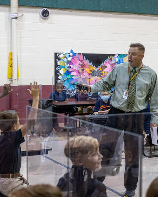 Students listen to instructions from a Steel Valley teacher during fifth grade Transition Day.