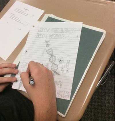 Student working on report cover