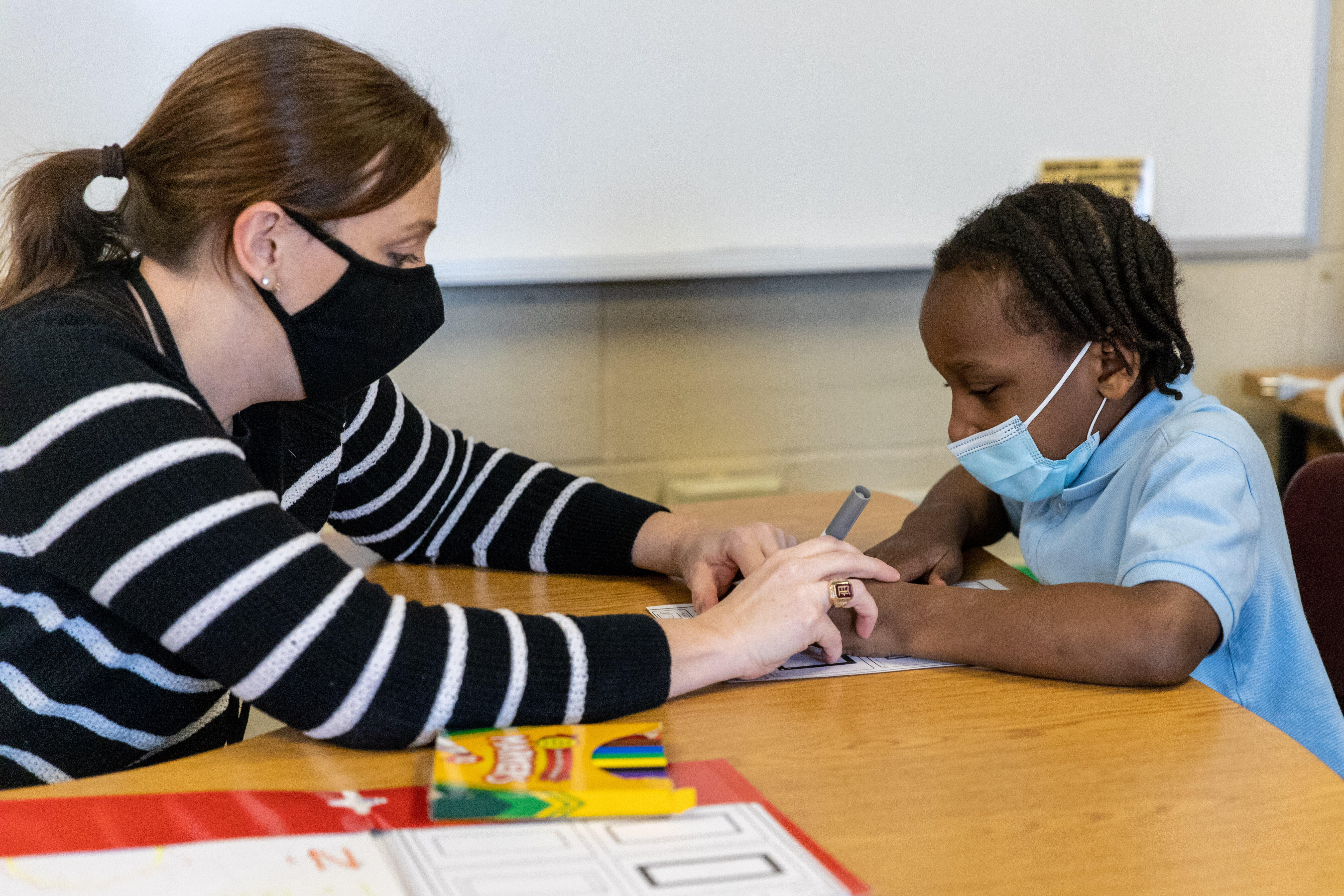 A specialist works with a student on some occupational therapy as part of a program at Barrett Elementary.