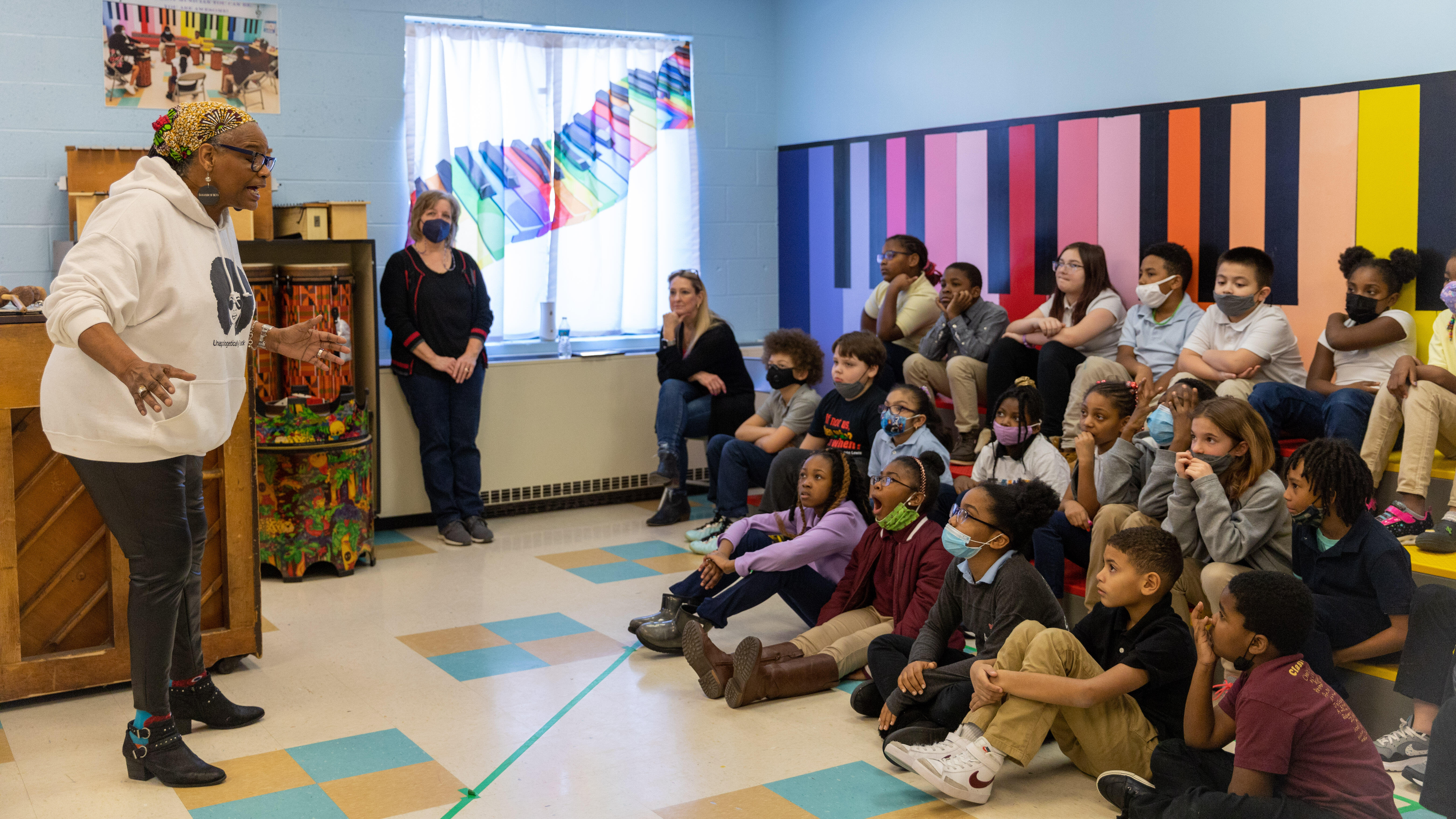A presenter shares a story with a captivated audience during the Barrett Black History Month Interactive Living Museum