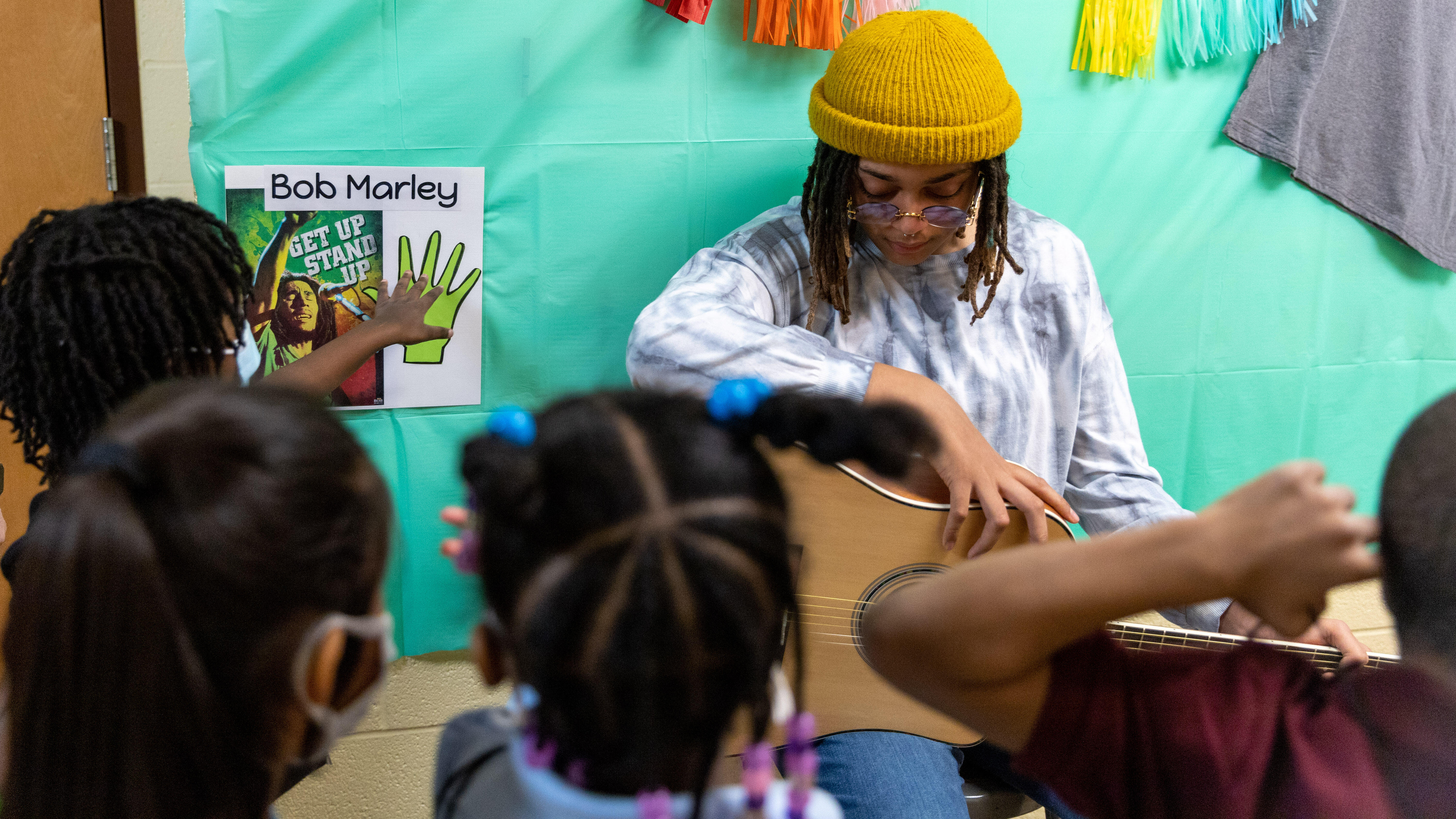 A Steel Valley student portrays Bob Marley for younger students at the Black History Month Interactive Living Museum.
